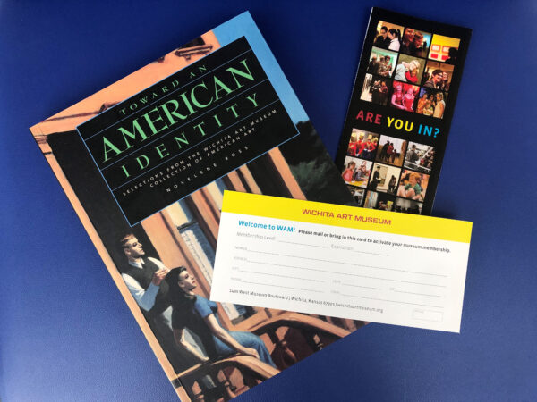 Photo of a collection catalogue, a membership brochure and a membership form against a blue background