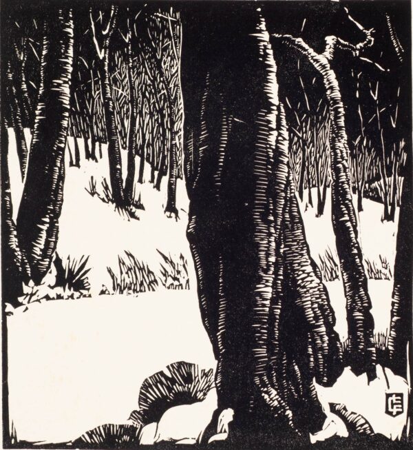 Black and white block print of tree trunks on a snow-covered hillside