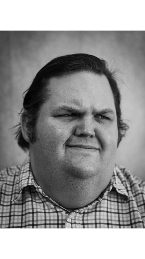 Close up, black and white headshot of Daniel Pewewardy